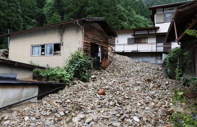 Torrential rain in central Japan Photo taken July 9, 2020, shows a house damaged by a mudslide following torrential rain in Gero in Gifu Prefecture, central Japan.