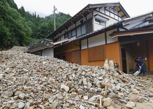 Torrential rain in central Japan Photo taken July 9, 2020, shows the site of a mudslide in Gero, Gifu Prefecture, central Japan, triggered by torrential rain.