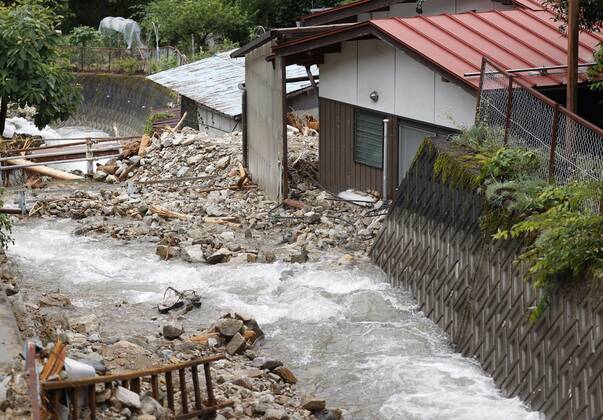 Torrential rain in central Japan Photo taken July 9, 2020, shows the site of a mudslide in Gero, Gifu Prefecture, central Japan, triggered by torrential rain.