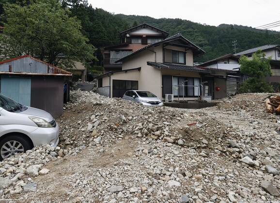Torrential rain in central Japan Photo taken July 9, 2020, shows the site of a mudslide in Gero, Gifu Prefecture, central Japan, triggered by torrential rain.