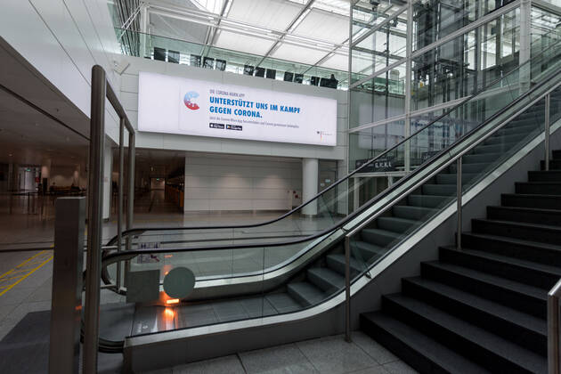 Effects Corona Munich Airport In picture Advertising board Terminal 2 T2 Corona Warn App Munich Airport Bayer Germany Copyright: Passion2Press MarkusxFischerx
