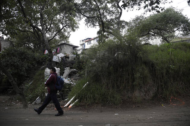 A man walks past the house where there was a multi-femicide. The bodies of 4 girls and one woman lifeless with gun shot wounds were found in the El Gavillero neighbourhood in northeast of Mexico City on July 8th, 2020 in Nicolas Romero, Mexico Where: Nicolas Romero, Mexico When: 09 Jul 2020 Credit: Eyepix Cover Images **EDITORIAL USE ONLY** Copyright: xMarianaxBaex 40706320 EDITORIAL USE ONLY. NOT FOR USE BY NEWSPAPERS BASED IN THE UK.