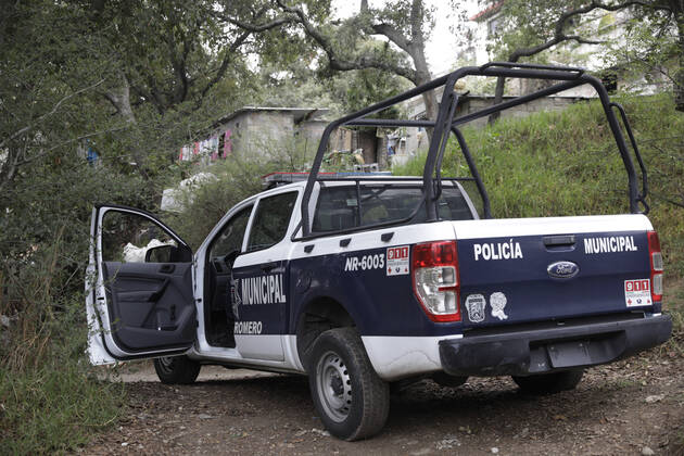 A police patrol vehicle in a guarded zone of the house where there was a multi-femicide. The bodies of 4 girls and one woman lifeless with gun shot wounds were found in the El Gavillero neighbourhood in northeast of Mexico City on July 8th, 2020 in Nicolas Romero, Mexico Where: Nicolas Romero, Mexico When: 09 Jul 2020 Credit: Eyepix Cover Images **EDITORIAL USE ONLY** Copyright: xMarianaxBaex 40706321 EDITORIAL USE ONLY. NOT FOR USE BY NEWSPAPERS BASED IN THE UK.