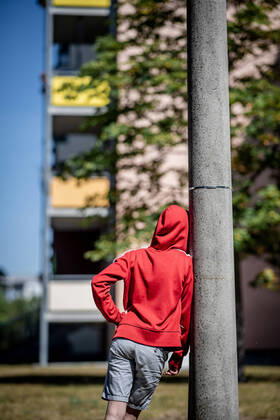 31 July 2020 Leipzig Saxony , Gruenau district A child is standing in front of a prefabricated building in Leipzig Gruenau