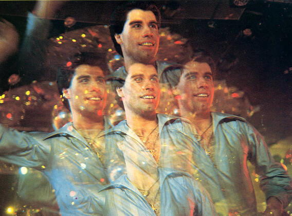 SATURDAY NIGHT FEVER JOHN TRAVOLTA Date: 1977. Strictly editorial use only in conjunction with the promotion of the film. Credit line mandatory. This image is copyright of the film company and is supplied under the terms of issue as film still. No commercial or book cover use permitted without prior consent from the film company.  Mandatory credit line: Image courtesy Robert Stigwood Organization Paramount Pictures Ronald Gra