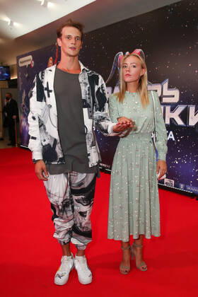 MOSCOW, RUSSIA - AUGUST 25, 2020: Actor Yevgeny Romantsov (L) and actress Viktoriya Agalakova attend the Moscow premiere of Dzhanik Fayziyev s fantasy film Cosmoball at the Karo 11 Oktyabr Cinema. Vyacheslav Prokofyev TASS  TS0E4AB2