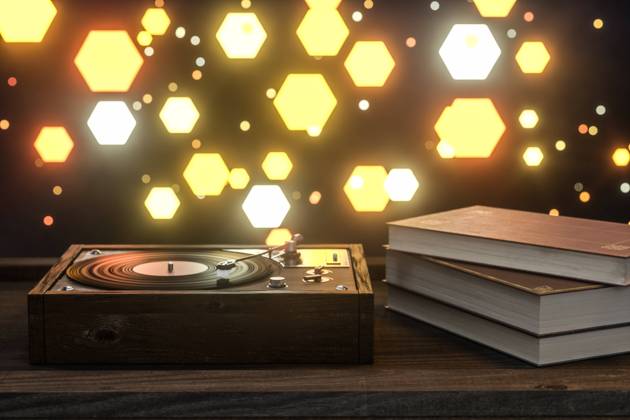 A vinyl record player on a wooden desktop, 3-D rendering  758086698749001810