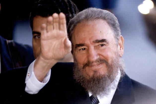 June 18, 2003, Santiago, Santiago, Chile: Fidel Castro visits Chile, Castro on arrival in Santiago greets his adherents Santiago Chile - ZUMAa202 20030618_zip_a202_001 Copyright: xFranciscoxAriasx