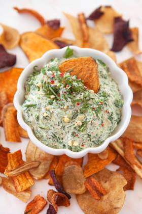 Key spinach dip with crispy chips of various vegetables 1079706267