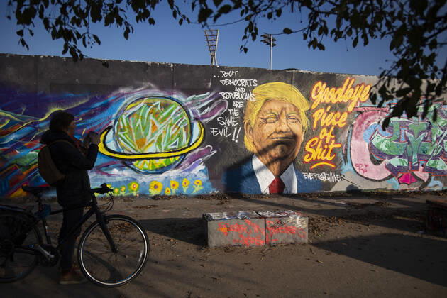 Graffiti by artist Eme Freethinker with picture of US President Donald Trump and writing Goodbye Piece of Shit in Mauerpark in Berlin on November 12, 2020 Donald Trump Graffiti in Berlin