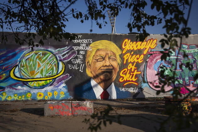 Graffiti by artist Eme Freethinker with picture of US President Donald Trump and writing Goodbye Piece of Shit in Mauerpark in Berlin on November 12, 2020 Donald Trump Graffiti in Berlin
