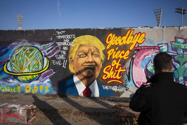 Graffiti by artist Eme Freethinker with picture of US President Donald Trump and writing Goodbye Piece of Shit in Mauerpark in Berlin on November 12, 2020 Donald Trump Graffiti in Berlin