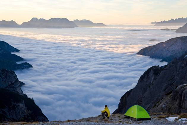 Man and tent above the clouds, Trentino-Alto Adige, South Tyrol in Bolzano district, Alta Pusteria, Hochpustertal,Sexten Dolomites, Italy Man and tent above the clouds, Trentino-Alto Adige, South Tyrol in Bolzano district, Alta Pusteria, Hochpustertal,Sexten Dolomites, Italy Man and tent above the clouds, Trentino-Alto Adige, South Tyrol in Bolzano district, Alta Pusteria, Hochpustertal,Sexten Dolomites, Italy
