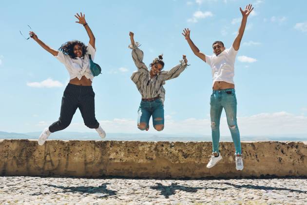 Group of friends doing tourism in Spain and contemplating the panoramic views of the Alhambra in Granada, Model released Copyright: xLuisxMarioxHernandezx MR