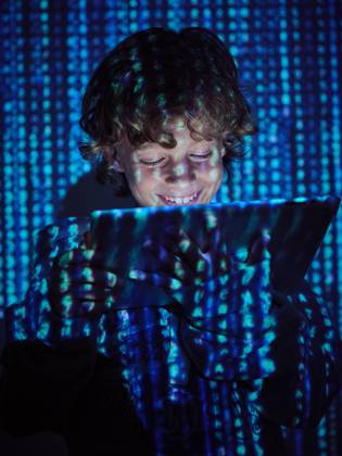 Hacker boy using tablet, Model released Copyright: xPhilippexDegrootex MR