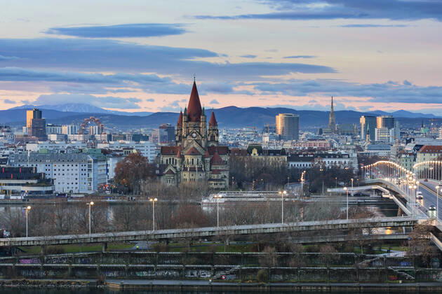 Vienna city center, river Donau (Danube), bridge Reichsbrücke, church Franz von Assisi, cathedral Stephansdom (St. Stephen s Cathedral), Ferris Wheel in Prater, mountain Schneeberg (left) Wien, Vienna Wien Austria 00. overview