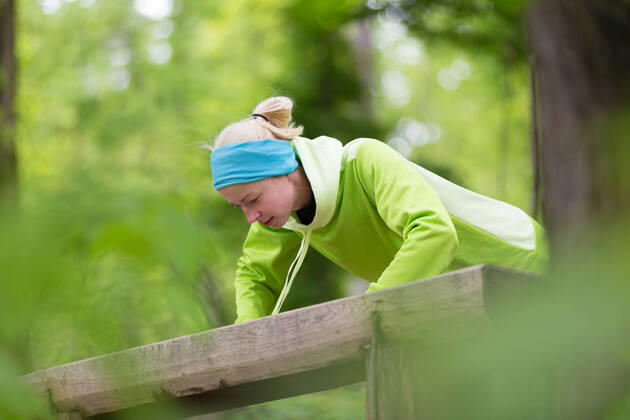 Sporty woman working out in forest. Sporty young female working out in forest. Female runner during outdoor workout in nature. Fitness model outdoors. Weight Loss. Healthy lifestyle., model releasedsport, workout, pushups, push-ups, exercise, active, girl, woman, forest, stretching, outdoor, fit, nature, female, activity, young, person, lifestyle, sporty, recreation, sportswear, athletic, outside, runner, leisure, fitness, energy, healthy, athlete, woods, park, vitality, jogging, train, one, health, action, adult, cross-country, jog, training, trees, trail, endurance, blonde, running, run, summer, spring, bench,