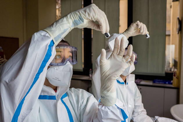 Milan. COVID19 Vaccine Mixing and preparation of the assay before administration Editorial Usage Only  Copyright: xCarloxCozzolix xIPAx