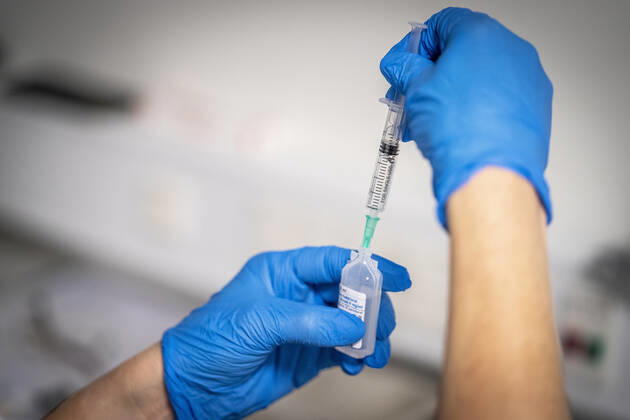 The vaccine is mixed before health personnel are vaccinated at Zealand University Hospital in Roskilde, Sunday 27 December 2020 Ten months after the first confirmed case of covid 19 in Denmark, the first vaccinations were initiated on Sunday. The Prime Minister compared with moon landing Denmark  Copyright: RitzauxScanpix MadsxClausxRasmussenx cop777 spdk20201227-183340-L