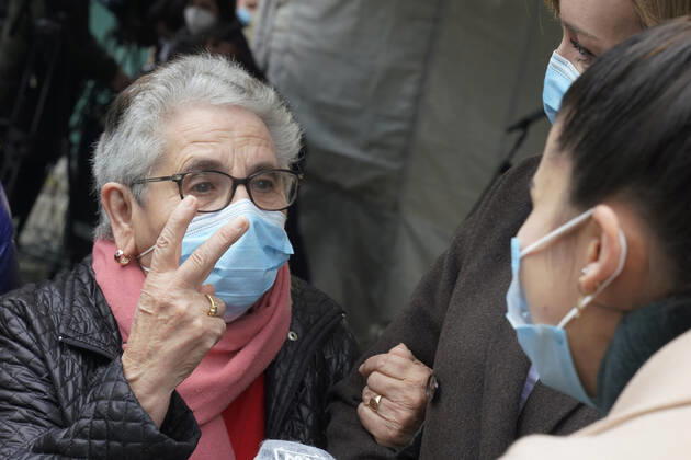 Nieves Cabo Vidal, an 82-year-old woman resident at the Porta do Camino senior center in Santiago, was the first person to receive the Covid-19 vaccine in Galicia, in Santiago de Compostela (Galicia, Spain), on December 27, 2020. The first doses of the vaccine developed by Pfizer and BioNtech laboratories arrived in Spain yesterday, December 26, at a Pfizer warehouse in Guadalajara by land from Puurs (Belgium). Starting Monday, weekly deliveries will be made to the autonomous communities with an average of 350,000 doses prioritized for four population groups: residents and health and social-health personnel in homes for the elderly and disabled; front-line health personnel; other health and social-health personnel and large non-institution Copyright: xÃlvaroxBallesterosx 3494914