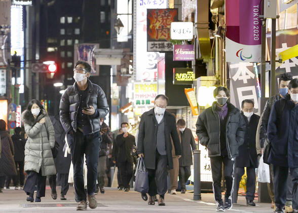 Nightlife establishments in Tokyo asked to shorten business hours People wearing face masks walk in Tokyo s Shimbashi area on Jan. 4, 2021, amid the coronavirus pandemic. Bars, restaurants and other nightlife establishments in Tokyo will be requested to shorten their business hours further as Japan plans to declare another state of emergency in the capital and three neighboring prefectures, possibly for about one month, to curb the spread of the new coronavirus in view of the unabated uptrend in infections. 