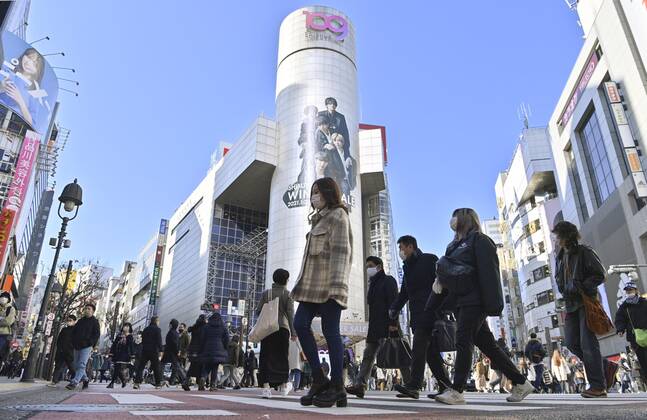 Japan may declare 1-month virus emergency for Tokyo area People wearing face masks walk at a scramble intersection in Tokyo s Shibuya area on Jan. 4, 2021, amid the coronavirus pandemic. Japan plans to declare another state of emergency in the capital and three neighboring prefectures, possibly for about one month, to curb the spread of the new coronavirus in view of the unabated uptrend in infections. 
