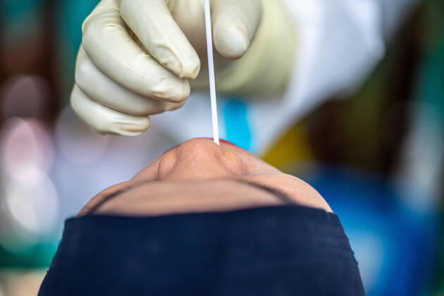 January 9, 2021, South Tangerang, Banten, Indonesia: South Tangerang, Banten, Indonesia 09 January 2021:Cotton but put in to a nose of a woman. Swab Test activity at Public Health Rawa Buntu, South Tangerang, Banten, Indoensia. Indonesia increasing the covid19 test as the number of the infection from the virus increas significantly since November 2020. South Tangerang Indonesia - ZUMAh128 20210109_zap_h128_006 Copyright: xDonalxHusnix