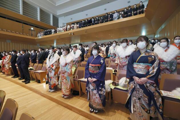 Coming-of-age ceremony under virus state of emergency People maintain social distancing during a coming-of-age ceremony in Tokyo s Suginami Ward on Jan. 11, 2021, as the capital is under a coronavirus state of emergency.