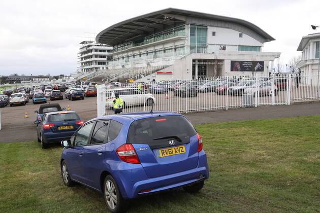 . 11 01 2021. Epsom, United Kingdom. The Covid 19 vaccination hub at the Epsom Racecourse in Surrey, as mass vaccinations start across the UK today . xStephenxLockx xi-Imagesx IIM-21977-0047