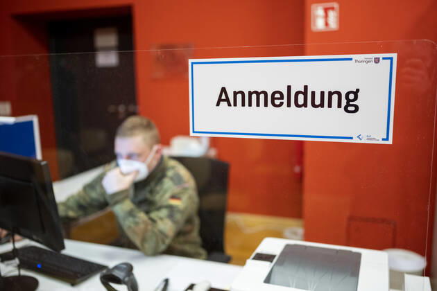 COVID 19 VACCINATION CENTER IN WEIMAR OPENS 13 01 2021 Weimar Soldiers of the German Armed Forces help with registration at the mon ami in Weimar, Thuringia, on 13 January 2021 The Free State of Thuringia started anti-COVID 19 vaccinations at vaccination centers on 13 January 2021