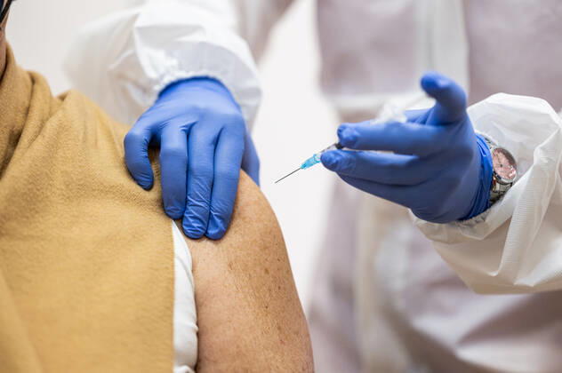 COVID 19 VACCINATION CENTER IN WEIMAR OPENS 13 01 2021 Weimar A woman gets vaccinated at the mon ami in Weimar, Thuringia, on 13 January 2021 The Free State of Thuringia has started anti-COVID 19 vaccinations at the vaccination centers on 13 January 2021