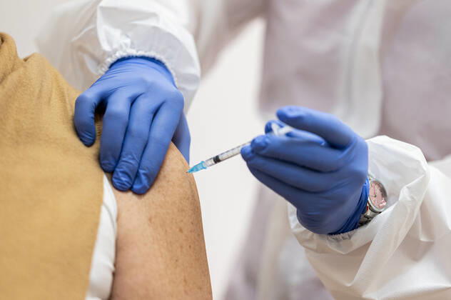 COVID 19 VACCINATION CENTER IN WEIMAR OPENS 13 01 2021 Weimar A woman gets vaccinated at the mon ami in Weimar, Thuringia, on 13 January 2021 The Free State of Thuringia has started anti-COVID 19 vaccinations at the vaccination centers on 13 January 2021