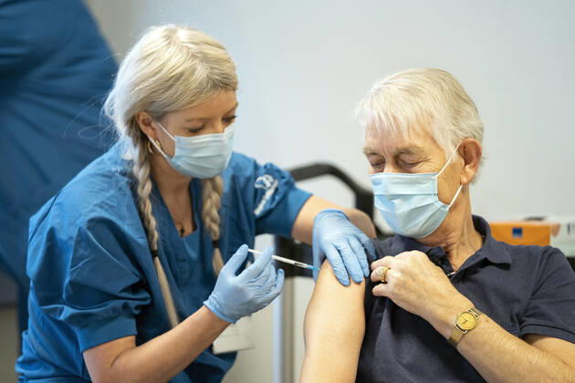 First citizen in Denmark will be vaccinated with covid 19 vaccine from Moderna in the vaccination center in Vejle Thursday 14 January 2021 75-year-old Andy Puggaard Thomsen from Goerding, pensioner and former salesman, will be vaccinated by Camilla Hagbart Villsen, Vejle Denmark  Copyright: FrankxCilius FrankxCiliusx COP102 spdk20210114-130436-L