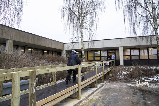 First citizen in Denmark is vaccinated with covid 19 vaccine from Moderna in the vaccination center in Vejle Thursday 14 January 2021 Here is an elderly woman with a walker on her way in, while another woman in a wheelchair is on her way out of the vaccination center, Vejle Denmark  Copyright: FrankxCilius FrankxCiliusx COP102 spdk20210114-132803-L