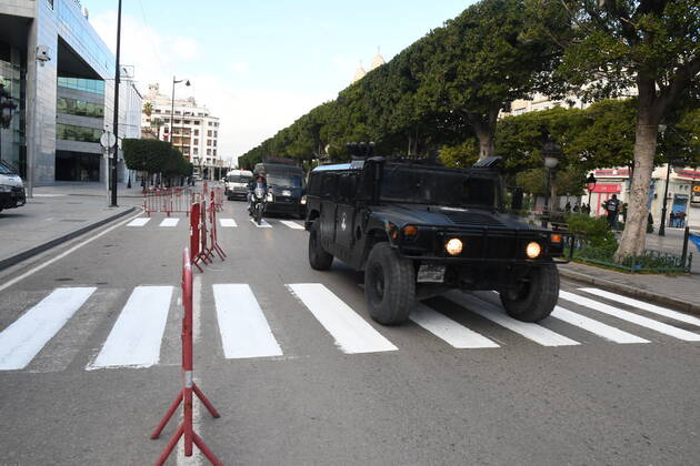 (210114) -- TUNIS, Jan. 14, 2021 -- Police vehicles run on a road during a lockdown in Tunis, Tunisia, on Jan. 14, 2021. Tunisia decided to impose a general lockdown for a period of four days starting from Thursday, to contain the rapid spread of COVID-19 in the country. (Photo by Xinhua) TUNISIA-TUNIS-COVID-19-LOCKDOWN AdelxEzzine 