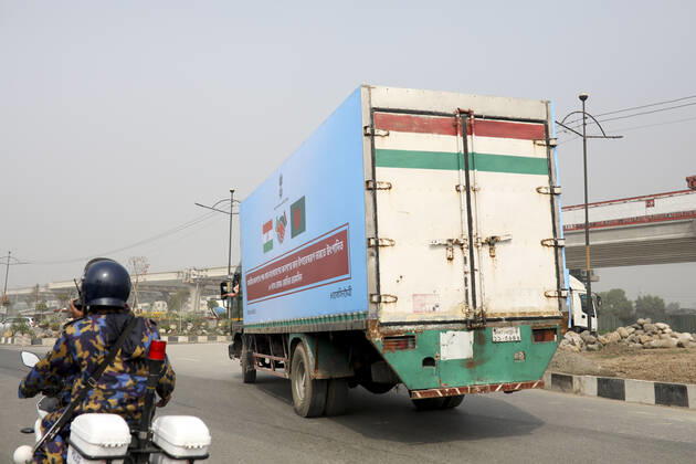 January 21, 2021, Dhaka, Bangladesh: A pickup van carries Oxford-Astrazeneca COVID-19 vaccines, which arrived from India as a gift to Bangladesh, from the Hazrat Shahjalal International Airport to the storage house, in Dhaka, Bangladesh. Dhaka Bangladesh - ZUMAr165 20210121_zip_r165_001 Copyright: xKazixSalahuddinx