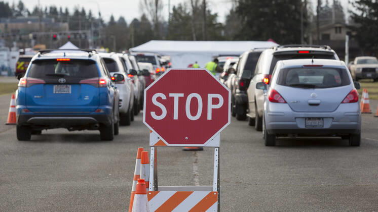 January 22, 2021, Monroe, Washington, USA: Cars cue up at a COVID-19 vaccination site at the Evergreen State Fairgrounds in Monroe, Washington on Friday, January 22, 2021. The site reopened today after closing on Thursday due to a shortage of vaccine stock. This week, Washington State moved to Phase 1B tier 1 making vaccines available to anyone 65 and older and all peopleÃ‚ 50 and older who also live in a multigenerational household. Monroe USA - ZUMAg235 20210122_zap_g235_006 Copyright: xPaulxChristianxGordonx