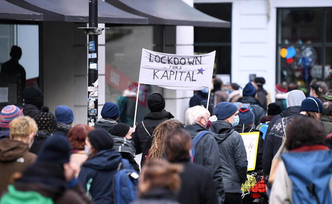 Tuebingen 23 01 2021 A left demo against Corona crisis management under the motto, solidarity instead of authority in Tuebingen A banner with the inscription Lockdown for capital ulmer