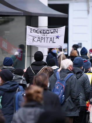 Tuebingen 23 01 2021 A left demo against Corona crisis management under the motto, solidarity instead of authority in Tuebingen A banner with the inscription Lockdown for capital ulmer