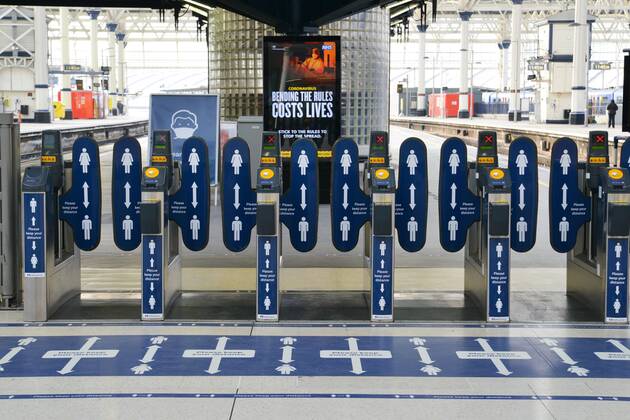 January 23, 2021, London, United Kingdom: Ticket barriers with social distancing signs seen at an almost empty London Waterloo railway station in London..Prime Minister Boris Johnson announced that there was evidence that the new variant of the coronavirus is more deadly. London United Kingdom - ZUMAs197 20210123_zaa_s197_135 Copyright: xThomasxKrychx
