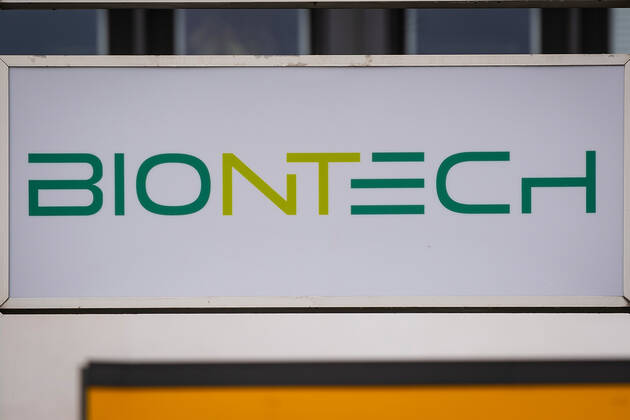 24 01 2021, xovx, economy, current affairs, Biontech produces Corona vaccine in Marburg Symbol photo Company logo Biontech on a company signpost at Behringwerke in Marburg, Biontech has been granted permission to operate its new p