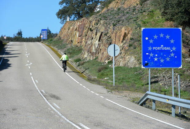 Image Licensed to Parsons Media. 30 01 2021. Valverde del Fresno, Spain. Portugal closes land borders. A man riding a bike crosses the land border between Spain and Portugal over the river Torto, in the North-West of Extremadura, this afternoon. From Sunday, Portugal will close its land border with Spain, for a period of at least two weeks in an attempt to contain the coronavirus. In this way, the Portuguese country, will reintroduce police controls along the1,214km border with Spain. However it is understood that essential movements will be still allowed, such for workers, medical reasons and goods s transportation. Copyright: xGustavoxValientex xParsonsxMediax PAR-7067-0001