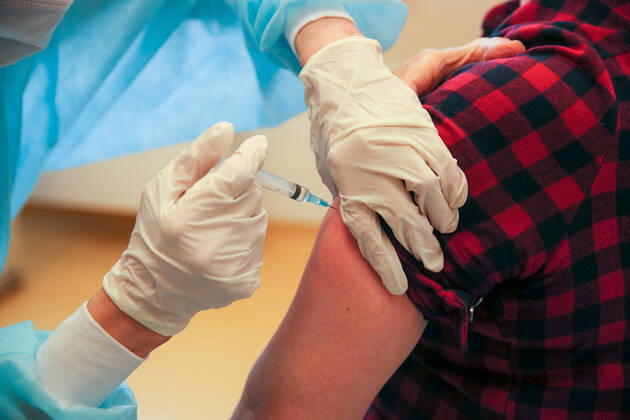 SOCHI, RUSSIA - FEBRUARY 1, 2021: A patient gets a shot of the Gam-COVID-Vak (Sputnik V) vaccine against COVID-19 at Sochi s City Hospital No 4. Dmitry Feoktistov TASS  TS0F5AA6