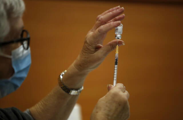 (210201) -- TEL AVIV, Feb. 1, 2021 -- A medical worker prepares the COVID-19 vaccine at a health service center in Tel Aviv, Israel, on Feb. 1, 2021. Israel s Ministry of Health reported 8,399 new COVID-19 cases on Monday, bringing the tally in the country to 651,405. The number of people vaccinated against the COVID-19 in Israel has surpassed 3.14 million, or 33.8 percent of its total population, since the vaccination campaign began on Dec. 20, 2020. (Photo by Xinhua) ISRAEL-TEL AVIV-COVID-19-VACCINATION GilxCohenxMagen