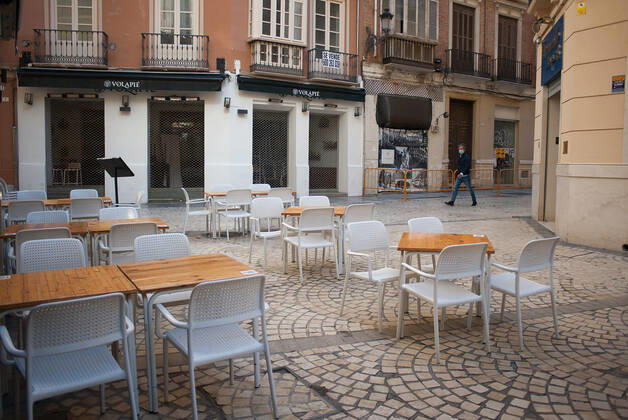 February 2, 2021, Malaga, Spain: An empty and deserted terrace during the closure of the hospitality sector and non-essential activities as part of a partial lockdown..For two weeks, besides the limit on mobility between cities, many municipalities and Costa del Sol districts (including the Malaga capital) will have to close bars, restaurants and stores as measures to curb the spread of the coronavirus pandemic. In the lead of Andalusia, Malaga is the city with more daily coronavirus infections and a high rate of hospitalizations. Malaga Spain - ZUMAs197 20210202_zab_s197_012 Copyright: xJesusxMeridax