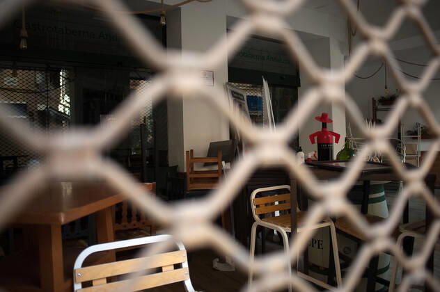 February 2, 2021, Malaga, Spain: Inside view into the closed Volapie bar during the closure of the hospitality sector and non-essential activities as part of a partial lockdown..For two weeks, besides the limit on mobility between cities, many municipalities and Costa del Sol districts (including the Malaga capital) will have to close bars, restaurants and stores as measures to curb the spread of the coronavirus pandemic. In the lead of Andalusia, Malaga is the city with more daily coronavirus infections and a high rate of hospitalizations. Malaga Spain - ZUMAs197 20210202_zab_s197_014 Copyright: xJesusxMeridax