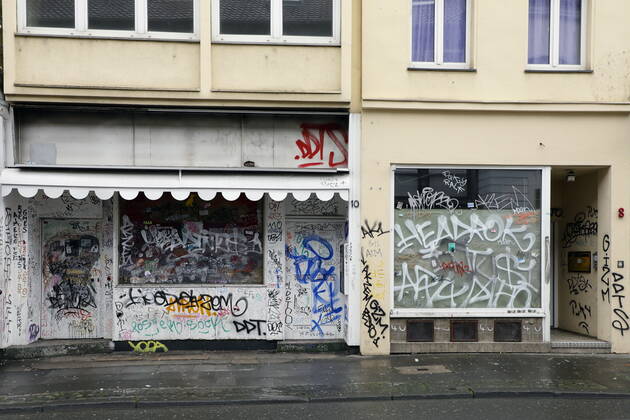 02 02 2021, Bonn, Germany Photo Graffiti-covered facades and shop windows in Bonn city centre