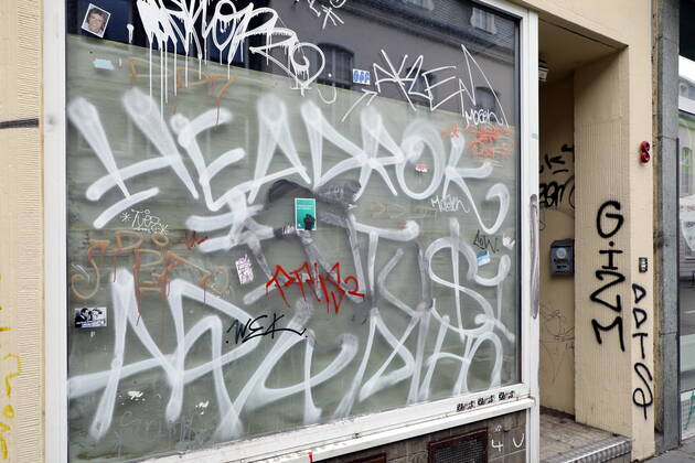 02 02 2021, Bonn, Germany Photo Graffiti-covered facades and shop windows in Bonn city centre