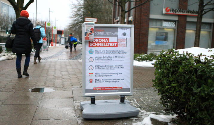 Advertising banner in front of the Corona test station in Hamburg Poppenbüttel at Heegbarg 16 Poppenbüttel Hamburg