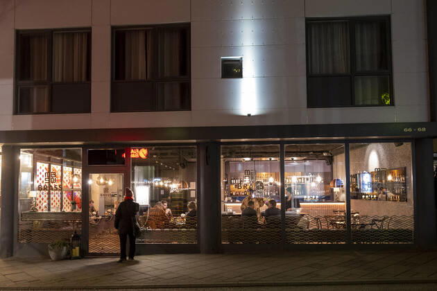Visitors at Kitchen Brass restaurant in Reykjavik Restaurants are allowed to be open for a